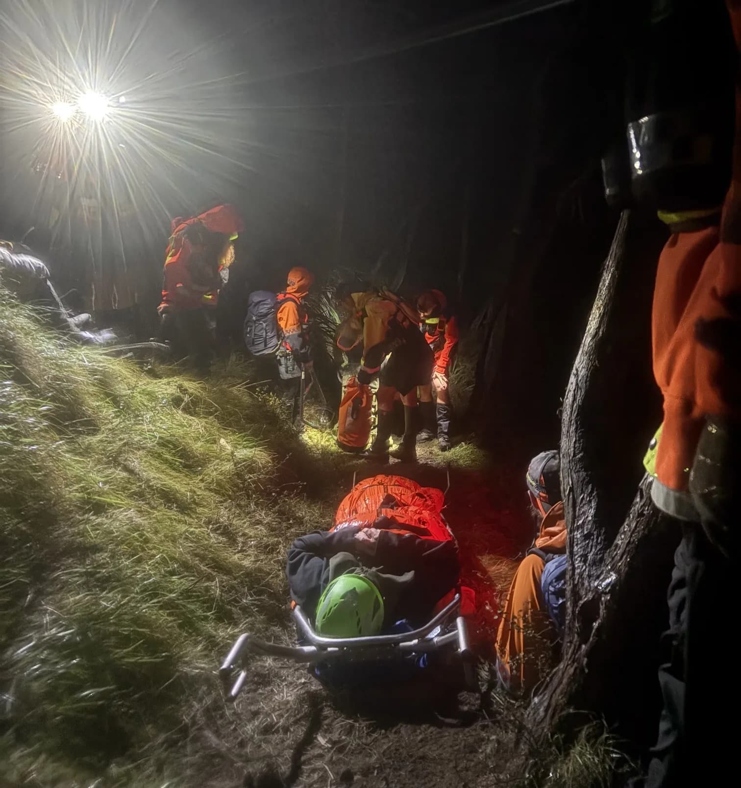 Photo of woman being rescued.